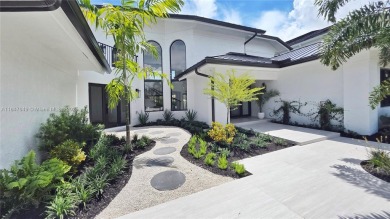 Located in Boca Grove, this charming remodel features a on Boca Grove Golf and Tennis in Florida - for sale on GolfHomes.com, golf home, golf lot