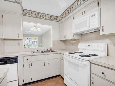 Bright & Open 2-Bedroom Villa in a Highly Desirable 55+ Active on Highland Lakes Executive Golf Course in Florida - for sale on GolfHomes.com, golf home, golf lot