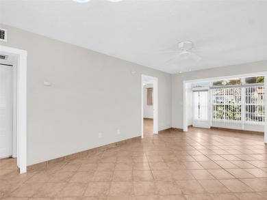 Bright & Open 2-Bedroom Villa in a Highly Desirable 55+ Active on Highland Lakes Executive Golf Course in Florida - for sale on GolfHomes.com, golf home, golf lot