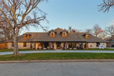 Nestled within the premier enclave of Oak Hollow Road in North on Quail Creek Golf and Country Club in Oklahoma - for sale on GolfHomes.com, golf home, golf lot