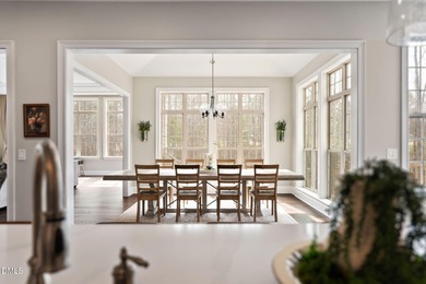 From holiday dinners to movie nights, this home was made for on Hasentree Club in North Carolina - for sale on GolfHomes.com, golf home, golf lot