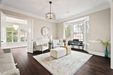 From holiday dinners to movie nights, this home was made for on Hasentree Club in North Carolina - for sale on GolfHomes.com, golf home, golf lot