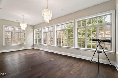 From holiday dinners to movie nights, this home was made for on Hasentree Club in North Carolina - for sale on GolfHomes.com, golf home, golf lot