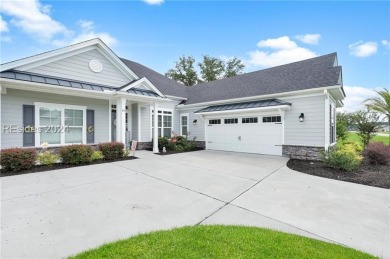 This stunning home is a light-filled haven with 3 bedrooms and 2 on Hilton Head Lakes Golf Club in South Carolina - for sale on GolfHomes.com, golf home, golf lot