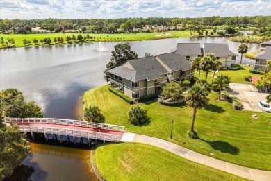 Beautiful corner condominium with serene pond views located in on Plantation Bay Golf and Country Club in Florida - for sale on GolfHomes.com, golf home, golf lot