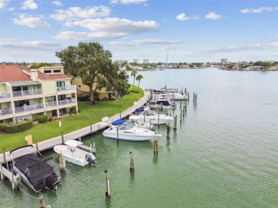 Welcome to your dream waterfront townhome in the exclusive on Treasure Bay Golf and Tennis in Florida - for sale on GolfHomes.com, golf home, golf lot