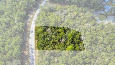 Approximately one-third acre homesite with beautiful trees on Citrus Springs Country Club in Florida - for sale on GolfHomes.com, golf home, golf lot