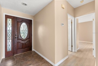 Beautiful corner condominium with serene pond views located in on Plantation Bay Golf and Country Club in Florida - for sale on GolfHomes.com, golf home, golf lot