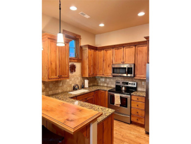 Don't miss this beautifully maintained Townhome in the desirable on Bridger Creek Golf Course in Montana - for sale on GolfHomes.com, golf home, golf lot