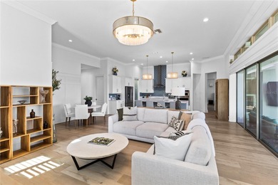 Gated golf course living with panoramic water views in Eagle on Eagle Creek Golf Club in Florida - for sale on GolfHomes.com, golf home, golf lot