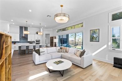 Gated golf course living with panoramic water views in Eagle on Eagle Creek Golf Club in Florida - for sale on GolfHomes.com, golf home, golf lot