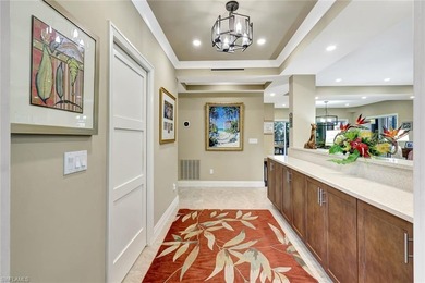 A custom design like no other! This three bedroom 2 bath condo on Club at Pelican Bay Golf Course in Florida - for sale on GolfHomes.com, golf home, golf lot