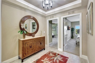 A custom design like no other! This three bedroom 2 bath condo on Club at Pelican Bay Golf Course in Florida - for sale on GolfHomes.com, golf home, golf lot