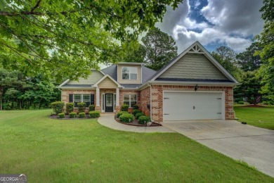 Perfect ranch home in popular Covington Place overlooking the on Indian Creek Golf Club in Georgia - for sale on GolfHomes.com, golf home, golf lot