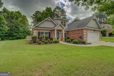 Perfect ranch home in popular Covington Place overlooking the on Indian Creek Golf Club in Georgia - for sale on GolfHomes.com, golf home, golf lot