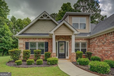 Perfect ranch home in popular Covington Place overlooking the on Indian Creek Golf Club in Georgia - for sale on GolfHomes.com, golf home, golf lot