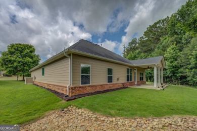 Perfect ranch home in popular Covington Place overlooking the on Indian Creek Golf Club in Georgia - for sale on GolfHomes.com, golf home, golf lot