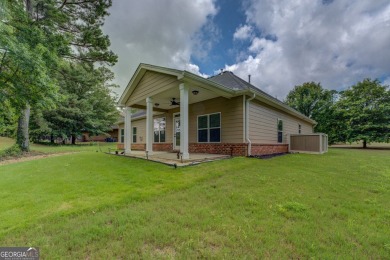 Perfect ranch home in popular Covington Place overlooking the on Indian Creek Golf Club in Georgia - for sale on GolfHomes.com, golf home, golf lot