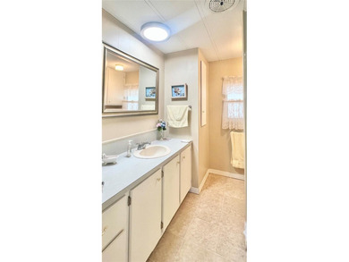 Enjoy easy Florida living in this light, bright, and beautifully on Fairway Village Golf Course in Florida - for sale on GolfHomes.com, golf home, golf lot