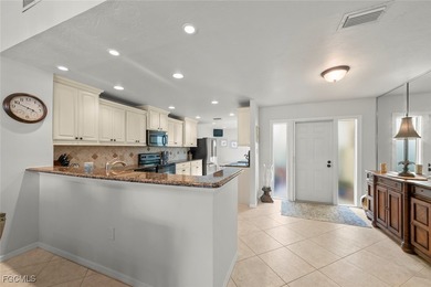 Nestled in the intimate Carriedale Cottages of Fiddlesticks on  in Florida - for sale on GolfHomes.com, golf home, golf lot