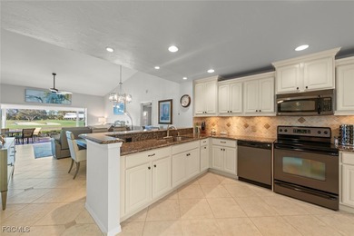 Nestled in the intimate Carriedale Cottages of Fiddlesticks on  in Florida - for sale on GolfHomes.com, golf home, golf lot