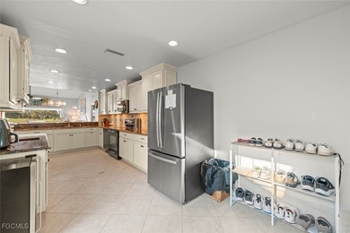 Nestled in the intimate Carriedale Cottages of Fiddlesticks on  in Florida - for sale on GolfHomes.com, golf home, golf lot