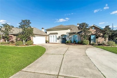 Beautifully updated home on the 12th tee box of Oak Harbor Golf on Oak Harbor Golf Club in Louisiana - for sale on GolfHomes.com, golf home, golf lot