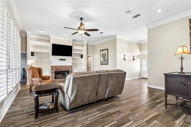 Beautifully updated home on the 12th tee box of Oak Harbor Golf on Oak Harbor Golf Club in Louisiana - for sale on GolfHomes.com, golf home, golf lot