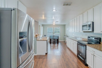 Welcome to this beauty in Captains Bay! This charming 2-bedroom on Rockport Country Club in Texas - for sale on GolfHomes.com, golf home, golf lot
