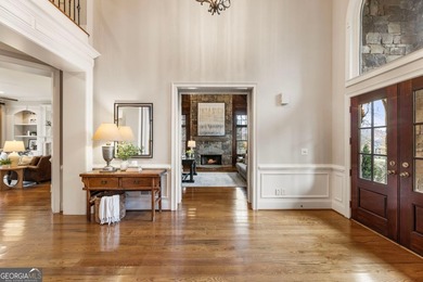 Set on a premium 1.59+ acre lot in the prestigious Manor Golf & on Manor Golf and Country Club in Georgia - for sale on GolfHomes.com, golf home, golf lot