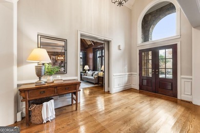 Set on a premium 1.59+ acre lot in the prestigious Manor Golf & on Manor Golf and Country Club in Georgia - for sale on GolfHomes.com, golf home, golf lot