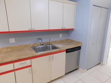 Welcome to this spacious first-floor condo, perfectly situated on Poinciana Golf Club in Florida - for sale on GolfHomes.com, golf home, golf lot