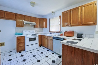 Southern Charm by the Sea! Welcome to 5704 N Kings Highway, a on Whispering Pines in South Carolina - for sale on GolfHomes.com, golf home, golf lot