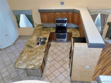 2.25 assumable loan to Qualified buyers 2-Story home located on on Chaparral Golf and Country Club in Arizona - for sale on GolfHomes.com, golf home, golf lot