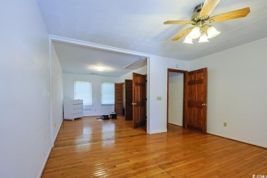 Southern Charm by the Sea! Welcome to 5704 N Kings Highway, a on Whispering Pines in South Carolina - for sale on GolfHomes.com, golf home, golf lot