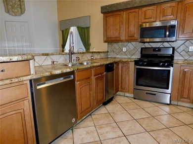 2.25 assumable loan to Qualified buyers 2-Story home located on on Chaparral Golf and Country Club in Arizona - for sale on GolfHomes.com, golf home, golf lot