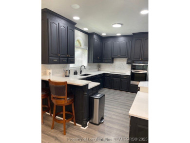 Welcome to this charming home in the highly sought-after golf on Baywood Golf Club in North Carolina - for sale on GolfHomes.com, golf home, golf lot