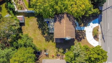 Southern Charm by the Sea! Welcome to 5704 N Kings Highway, a on Whispering Pines in South Carolina - for sale on GolfHomes.com, golf home, golf lot