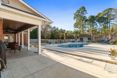 Welcome to your private paradise, perfectly positioned halfway on Carolina National Golf Club in North Carolina - for sale on GolfHomes.com, golf home, golf lot