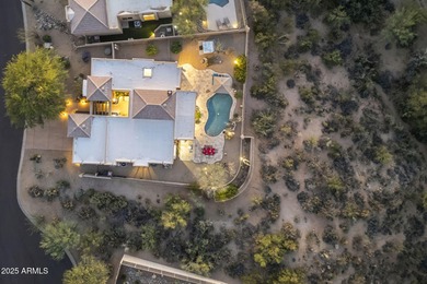 Experience refined indoor-outdoor living in this beautifully on Troon North Golf Club  in Arizona - for sale on GolfHomes.com, golf home, golf lot