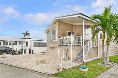 Discover carefree, relaxed island living in this quaint on Island Dunes Country Club in Florida - for sale on GolfHomes.com, golf home, golf lot