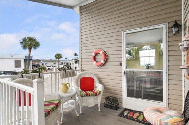 Discover carefree, relaxed island living in this quaint on Island Dunes Country Club in Florida - for sale on GolfHomes.com, golf home, golf lot