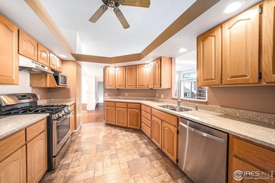 Wonderful home in the heart of Loveland; a block from Cattail on Cattail Creek Golf Course in Colorado - for sale on GolfHomes.com, golf home, golf lot