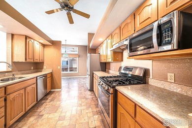 Wonderful home in the heart of Loveland; a block from Cattail on Cattail Creek Golf Course in Colorado - for sale on GolfHomes.com, golf home, golf lot