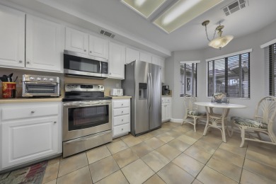 Step into this charming, brilliantly designed 2-bedroom on The Lakes Country Club in California - for sale on GolfHomes.com, golf home, golf lot