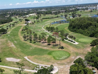 Step into this stunning split-floor plan residence and be on Tarpon Springs Golf Course in Florida - for sale on GolfHomes.com, golf home, golf lot