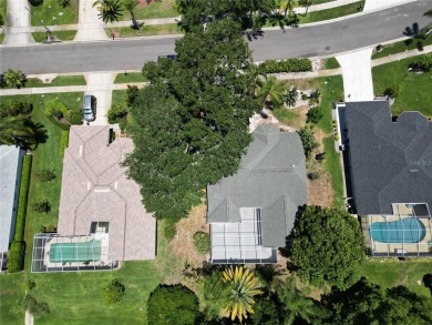 Step into this stunning split-floor plan residence and be on Tarpon Springs Golf Course in Florida - for sale on GolfHomes.com, golf home, golf lot