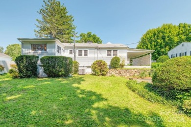 This stylish ranch home with mid century modern touches is a on Asheville Municipal Golf Course in North Carolina - for sale on GolfHomes.com, golf home, golf lot