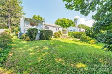 This stylish ranch home with mid century modern touches is a on Asheville Municipal Golf Course in North Carolina - for sale on GolfHomes.com, golf home, golf lot