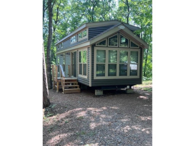 Have you been dreaming having your own permanent campsite?  Look on Voyager Village Country Club - Voyager in Wisconsin - for sale on GolfHomes.com, golf home, golf lot